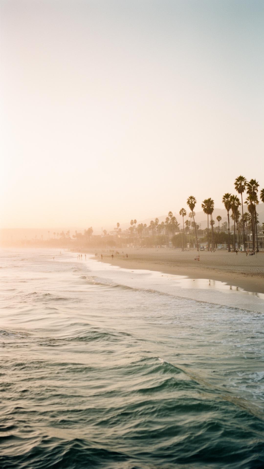 Soft golden-hour light over the Venice Beach coastline